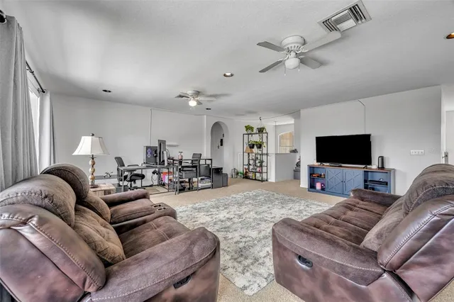a bathroom with a toilet a sink and a shower