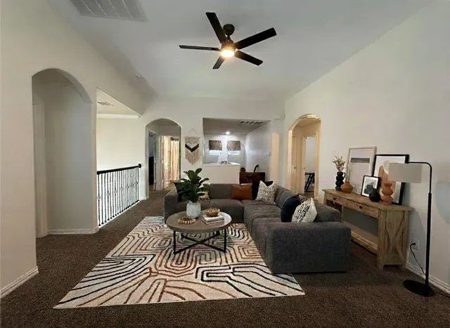 a kitchen with a refrigerator and a sink