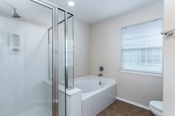a bathroom with a sink double vanity and a mirror