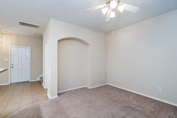 a kitchen with stainless steel appliances granite countertop a refrigerator and a stove