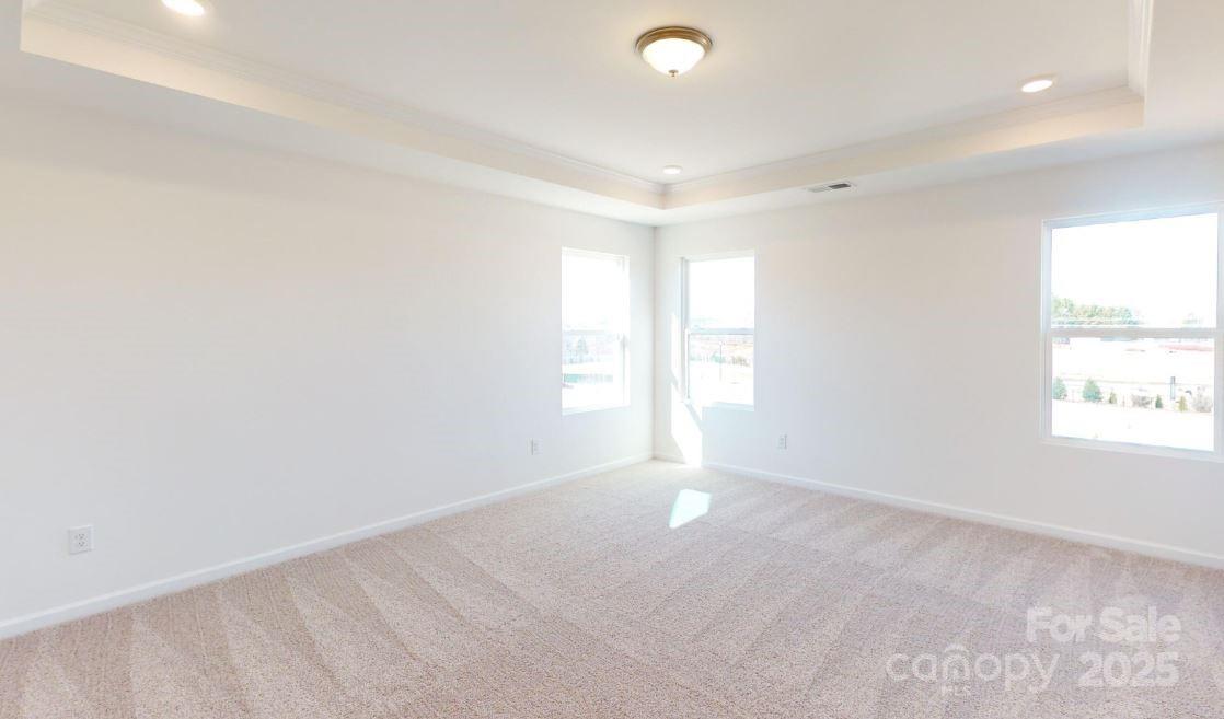 1805 Augustine Street Monroe, NC 28112 - Photo 15 of 17 an empty room with windows