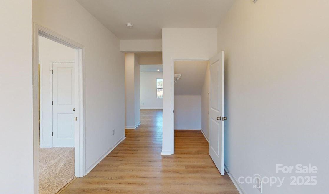 1805 Augustine Street Monroe, NC 28112 - Photo 2 of 17 a view of a hallway with wooden floor