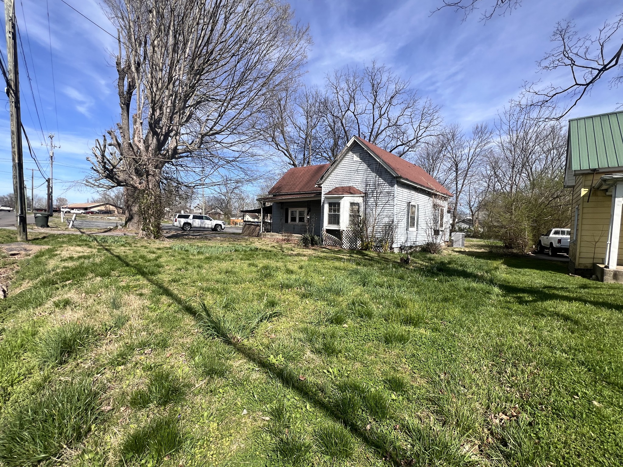 1506 South Main Street Springfield, TN 37172 - Photo 5 of 11 a front view of a house with a yard and garage