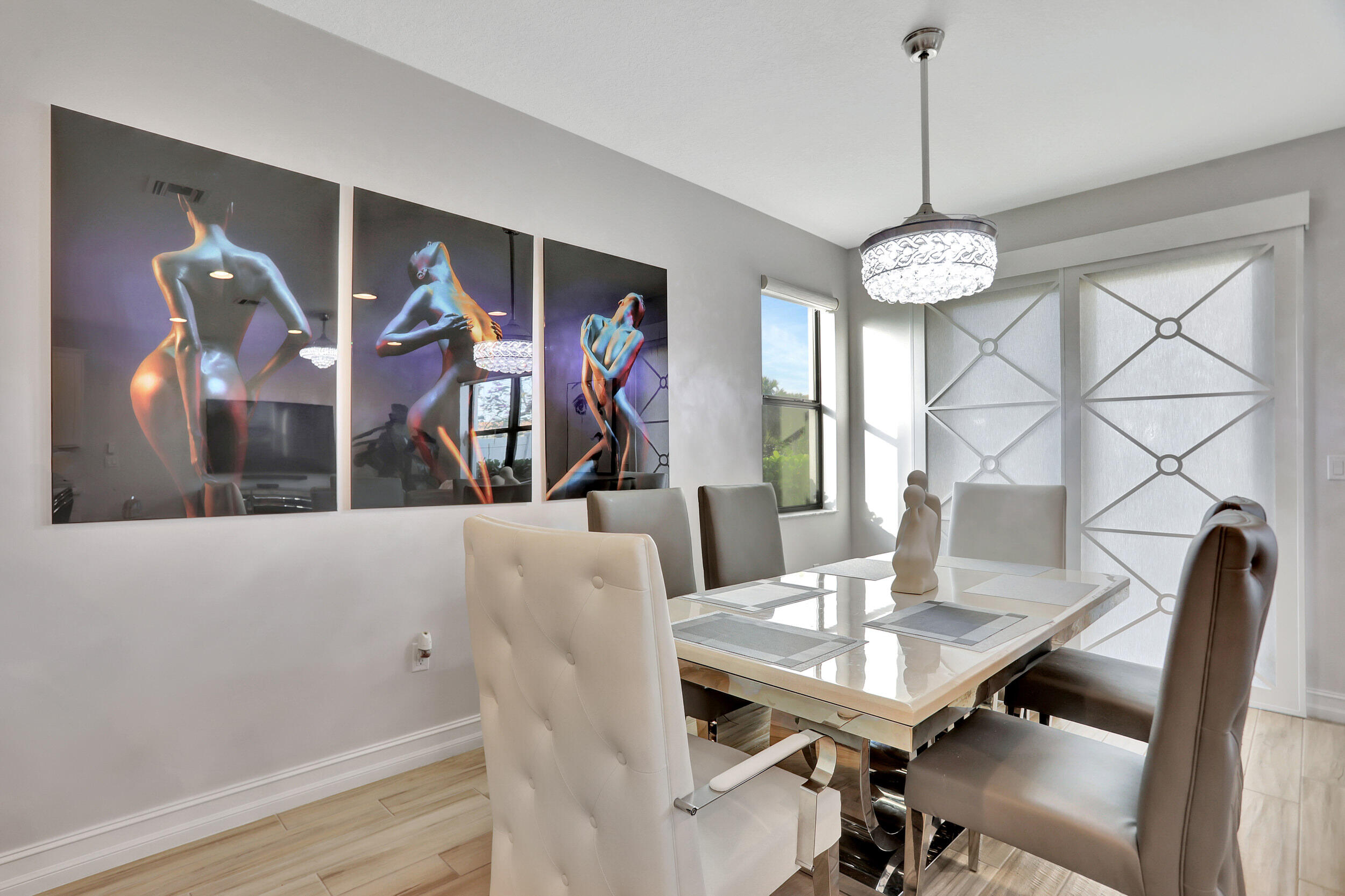 9517 Glider Way Boca Raton, FL 33428 - Photo 17 of 60 a view of a dining room with furniture and chandelier
