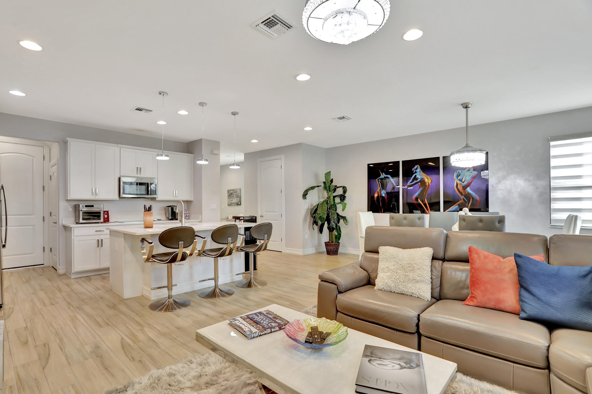 9517 Glider Way Boca Raton, FL 33428 - Photo 18 of 60 a living room with furniture kitchen and a table