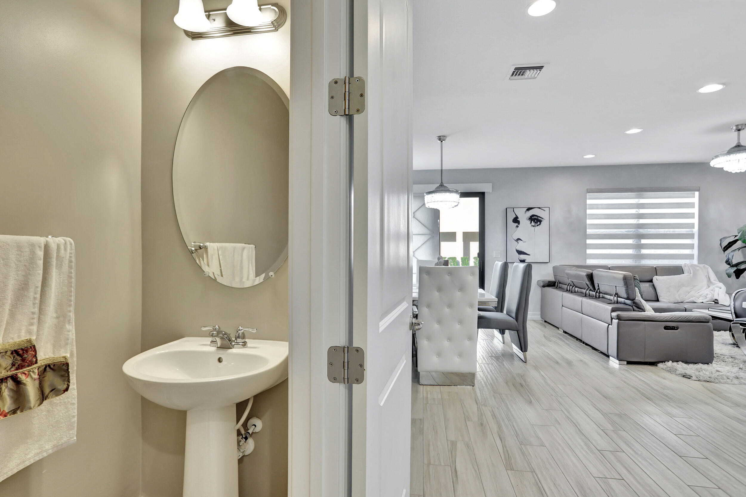 9517 Glider Way Boca Raton, FL 33428 - Photo 20 of 60 a spacious bathroom with a sink a mirror and a shower