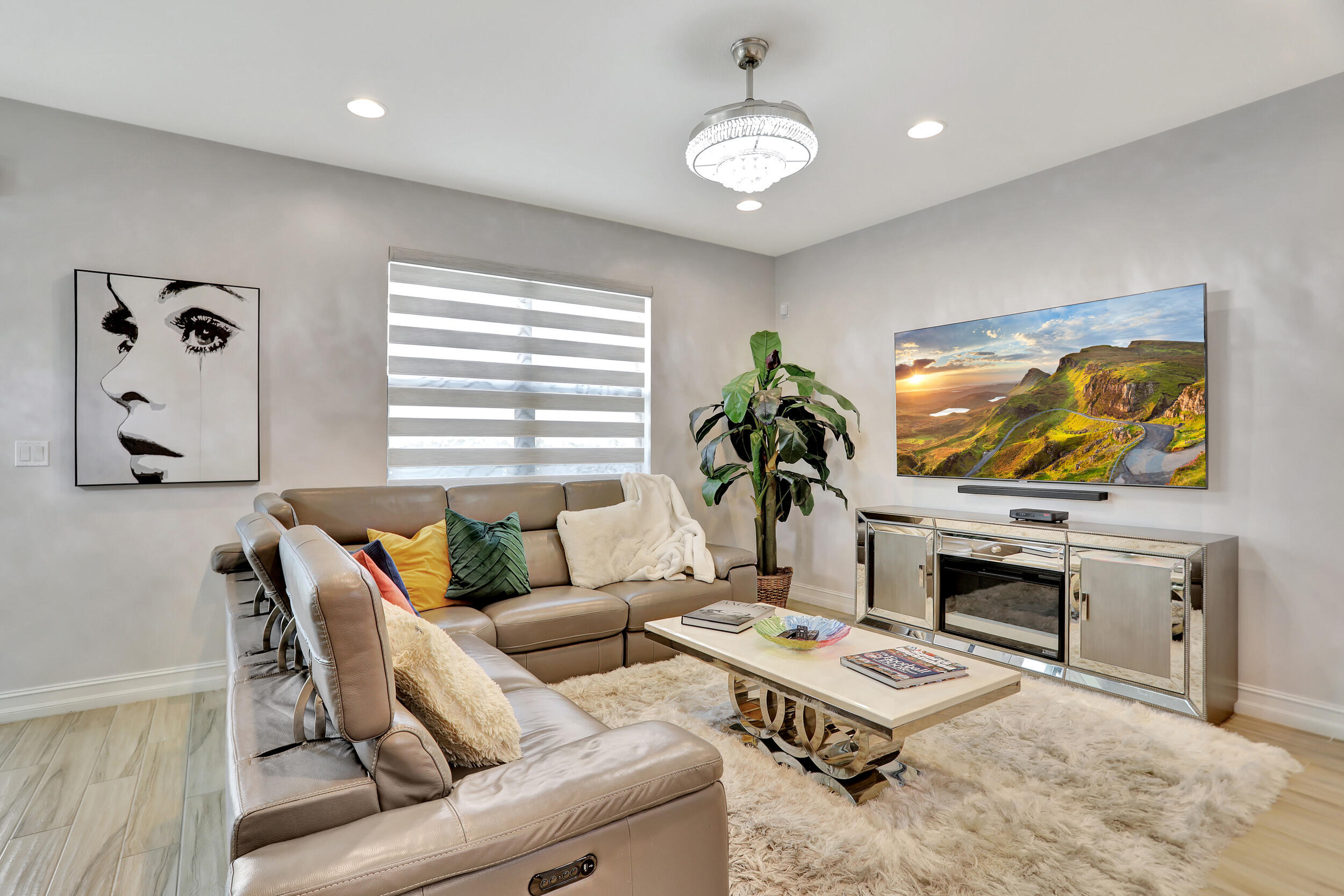 9517 Glider Way Boca Raton, FL 33428 - Photo 25 of 60 a living room with furniture kitchen view and a fireplace