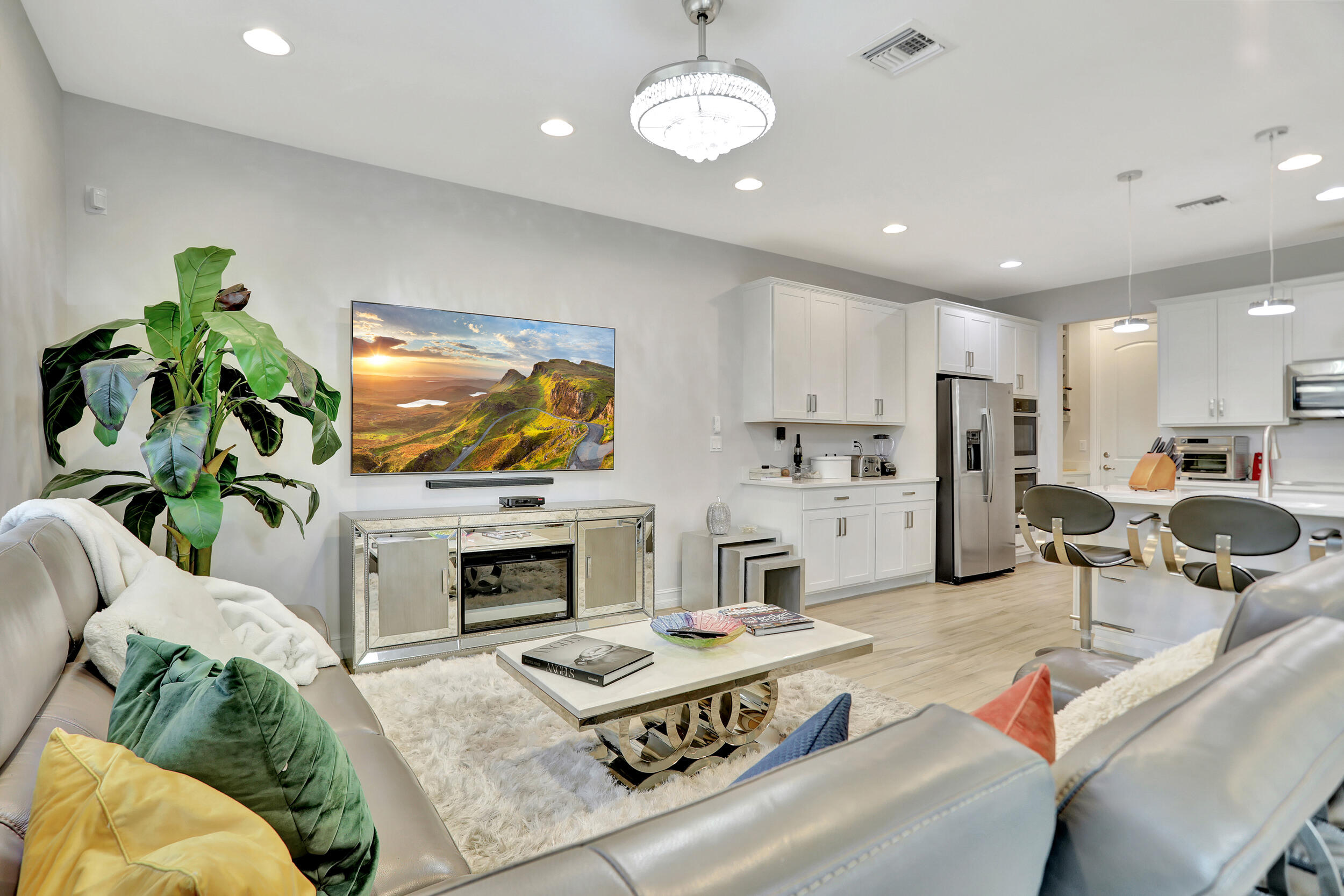9517 Glider Way Boca Raton, FL 33428 - Photo 26 of 60 a living room with furniture fireplace and flat screen tv