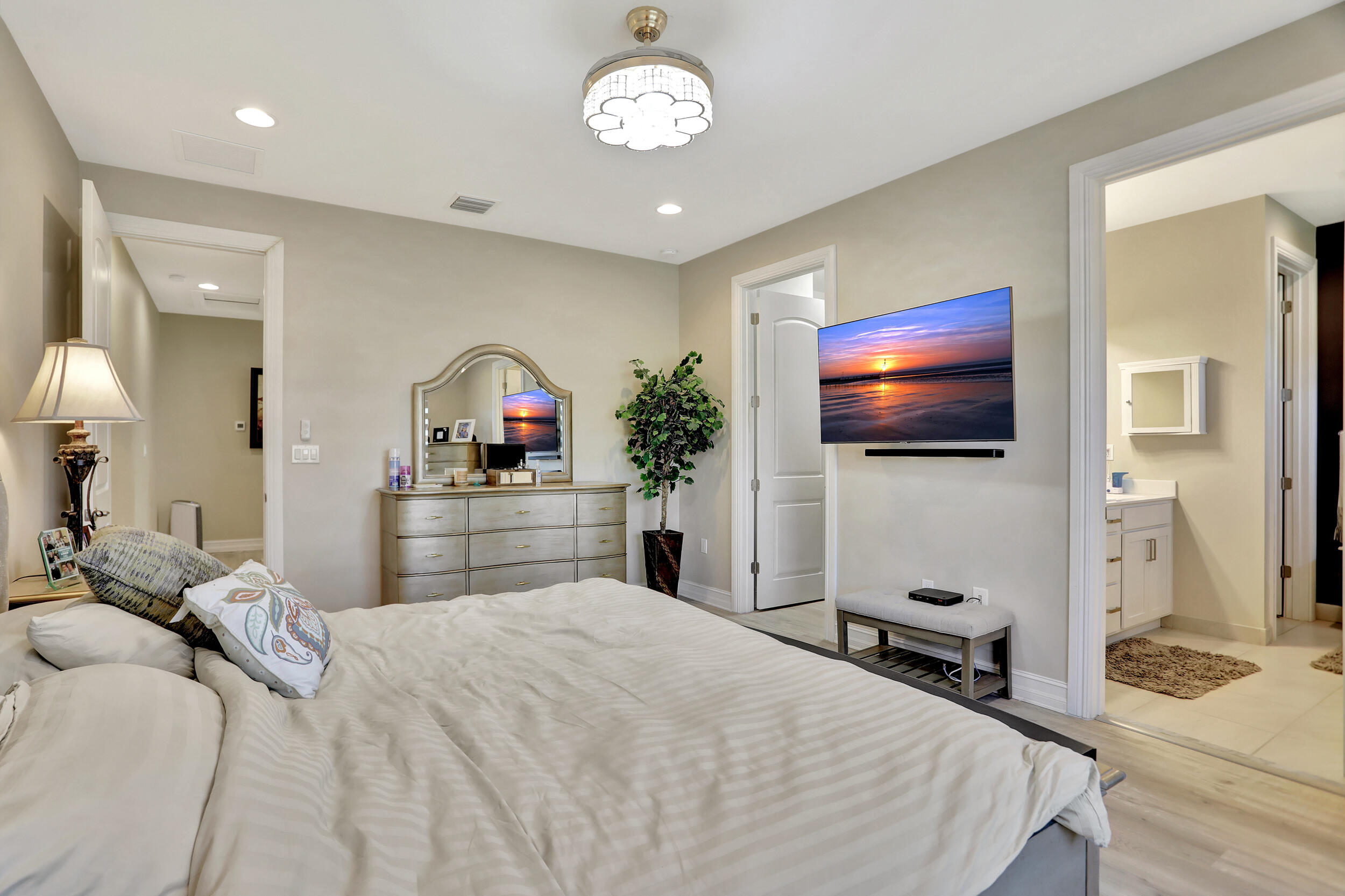 9517 Glider Way Boca Raton, FL 33428 - Photo 28 of 60 a bedroom with a bed and a flat screen tv