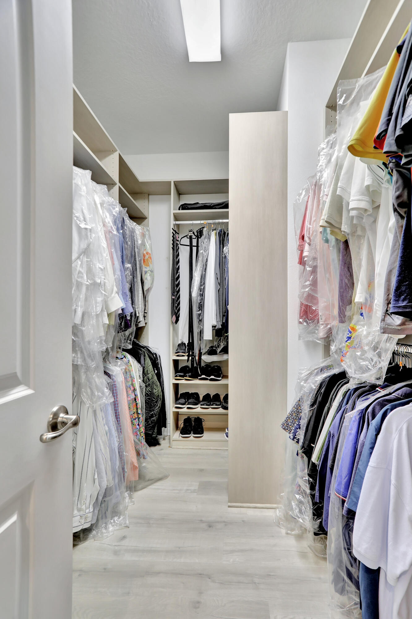 9517 Glider Way Boca Raton, FL 33428 - Photo 31 of 60 a view of walk in closet with clothes and shoes
