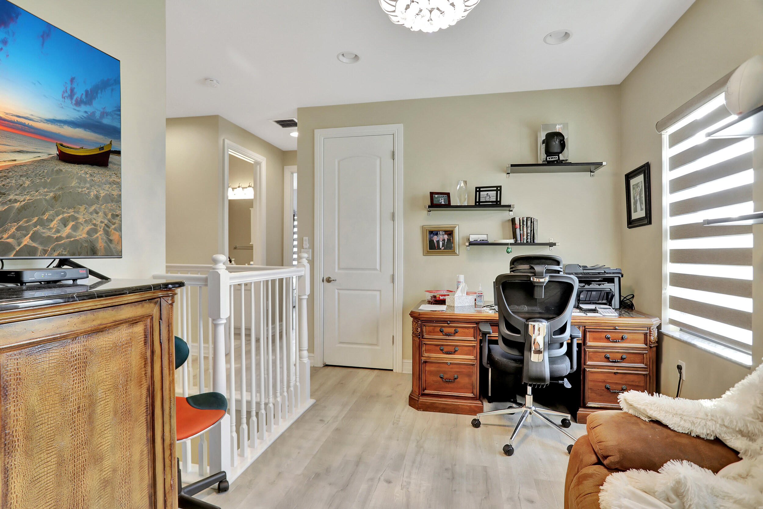 9517 Glider Way Boca Raton, FL 33428 - Photo 34 of 60 a view of a workspace with furniture and a window
