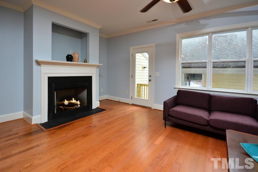 1524 North Duke Street Durham, NC 27701 - Photo 11 of 28 a living room with furniture and a fireplace