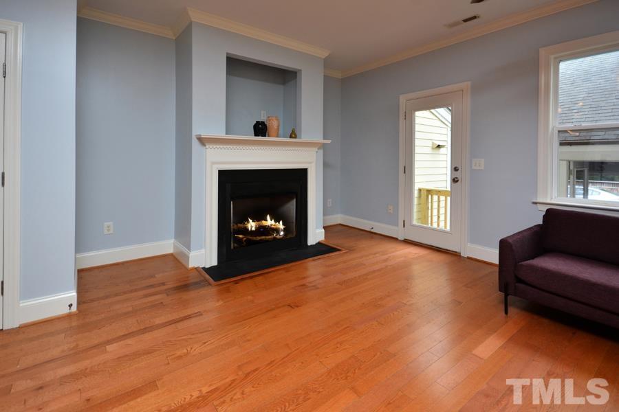 1524 North Duke Street Durham, NC 27701 - Photo 14 of 28 a living room with furniture and a fireplace