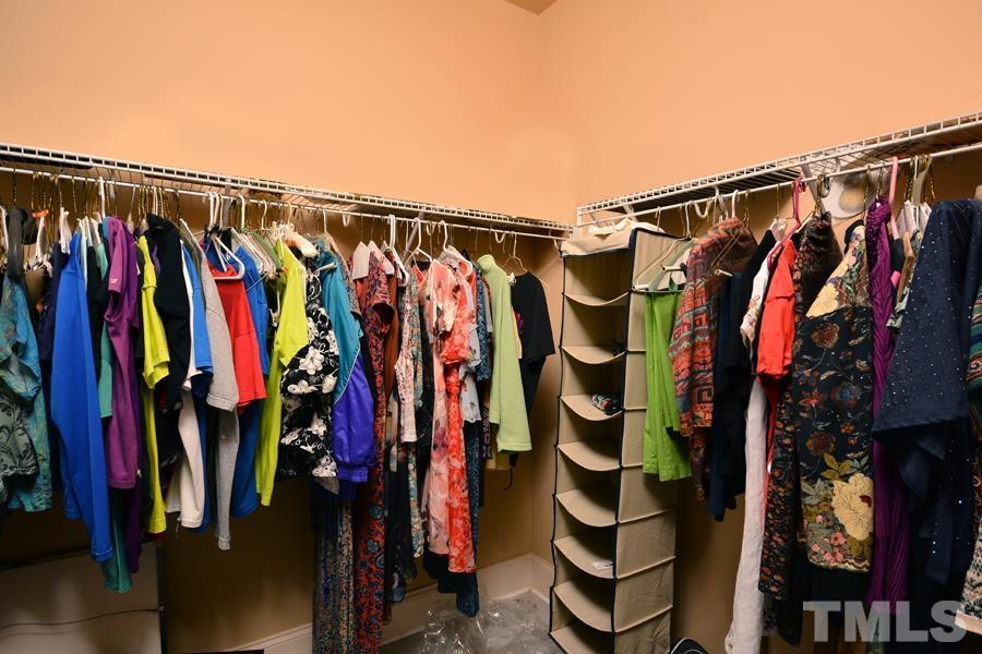 1524 North Duke Street Durham, NC 27701 - Photo 21 of 28 a view of walk in closet with clothes