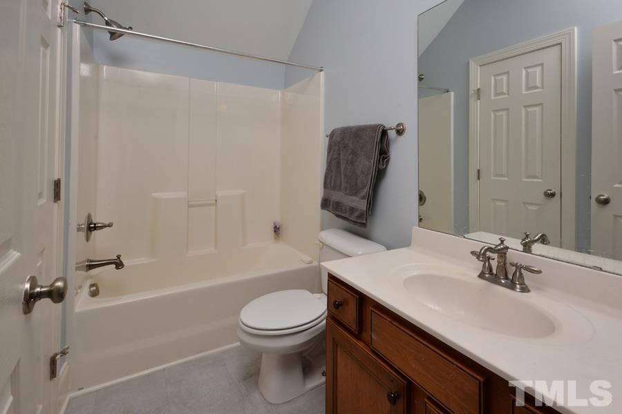 1524 North Duke Street Durham, NC 27701 - Photo 25 of 28 a bathroom with a sink toilet and shower
