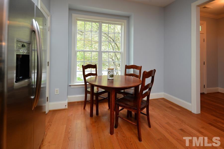 1524 North Duke Street Durham, NC 27701 - Photo 7 of 28 a dining room with furniture and wooden floor
