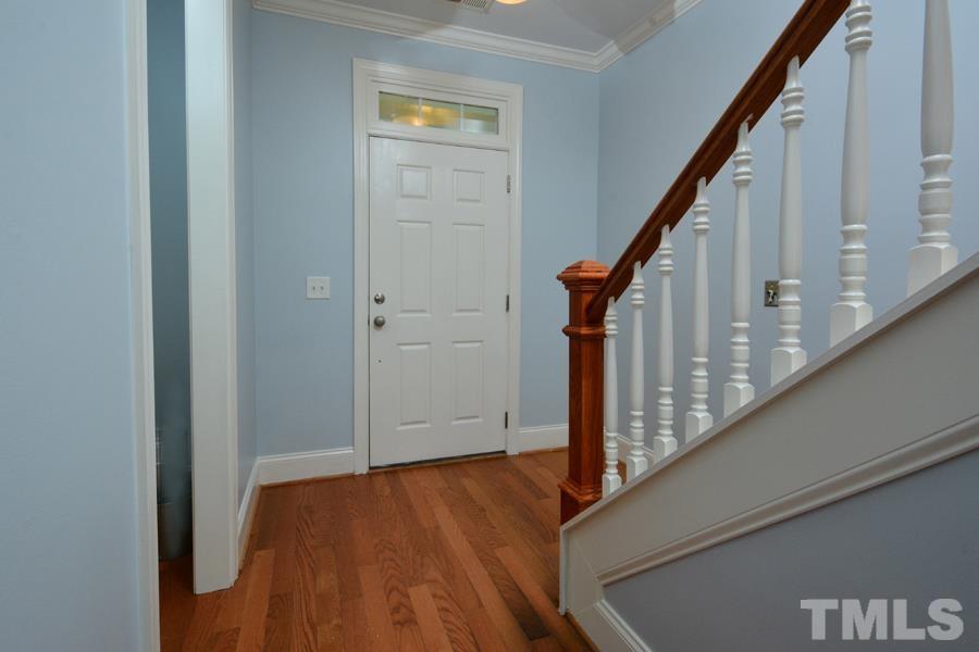 1524 North Duke Street Durham, NC 27701 - Photo 10 of 28 a view of staircase with wooden floor and white walls