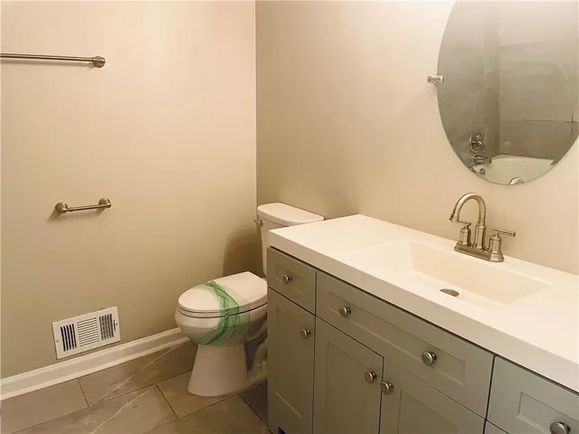 a bathroom with a sink and a toilet