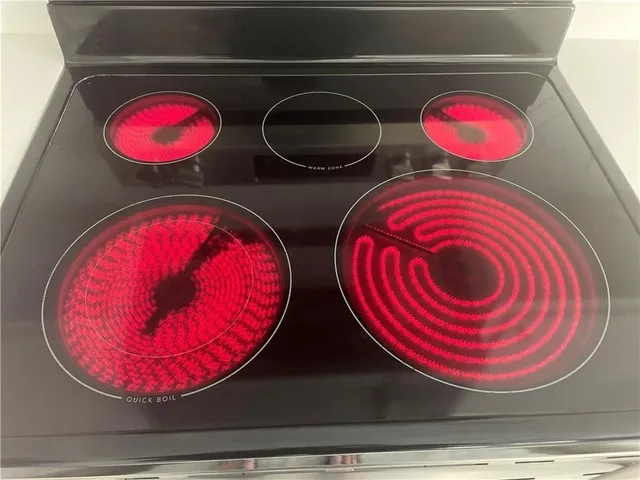 a view of cabinets and has a fireplace