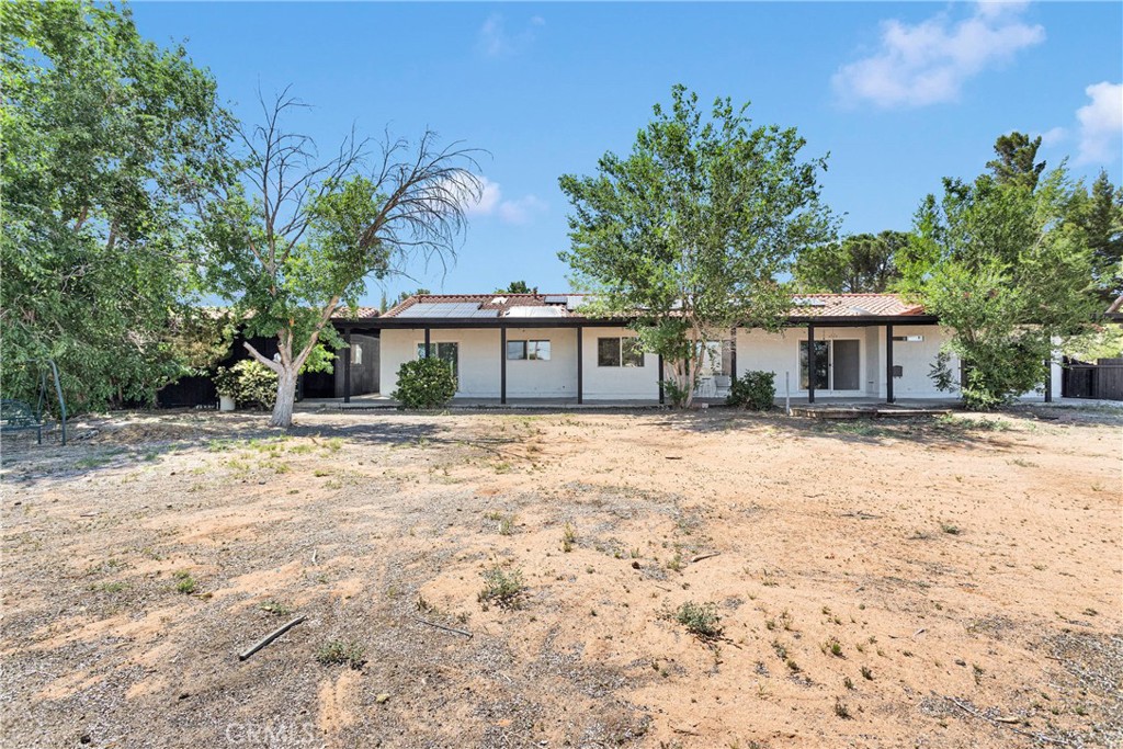 14855 Flathead Road Apple Valley, CA 92307 - Photo 13 of 14 front view of a house with a yard