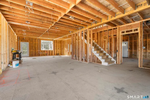 a view of a room with wooden walls