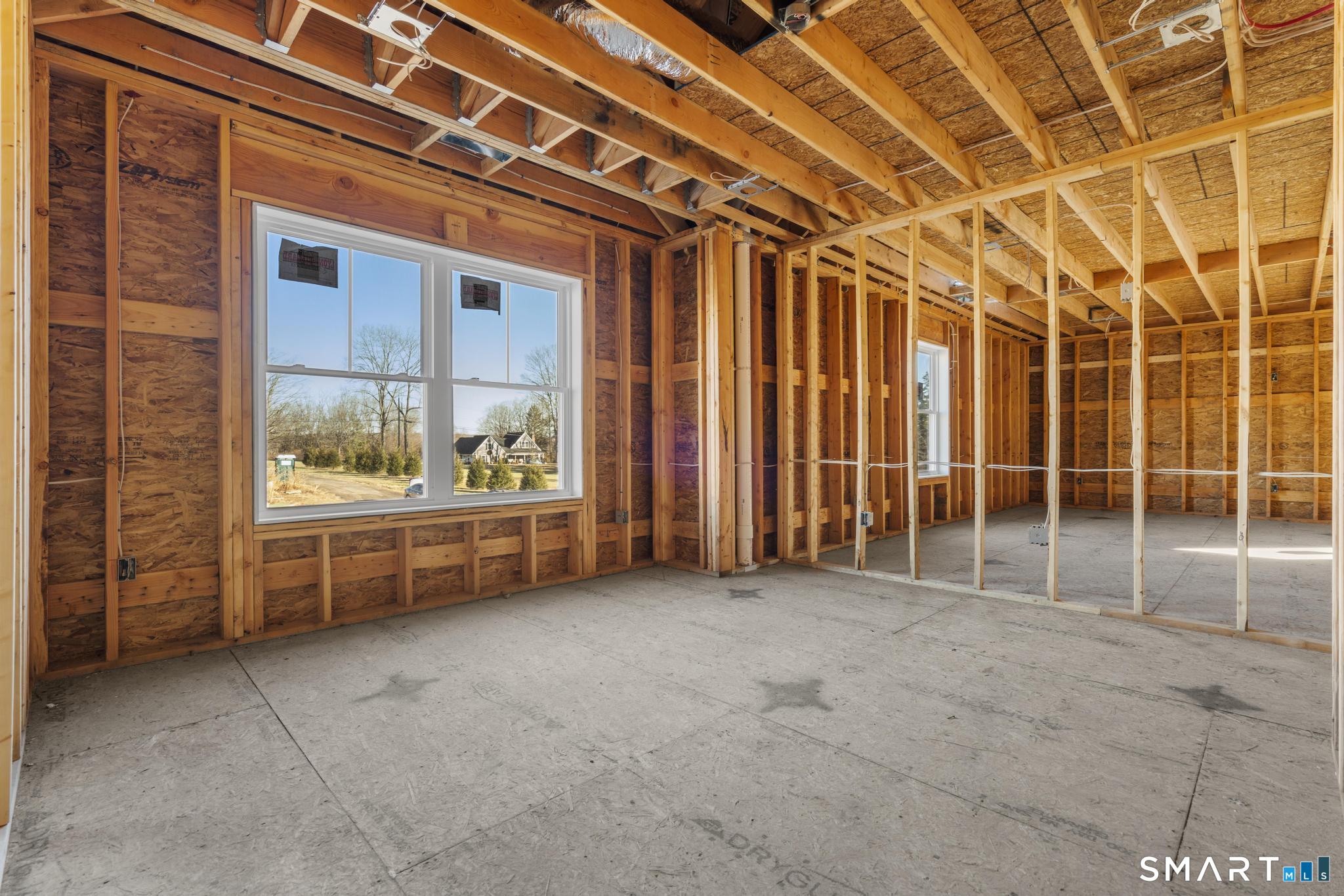154 B Long Meadow Hill Road Brookfield, CT 06804 - Photo 20 of 37 a view of a room with wooden walls and next to a window