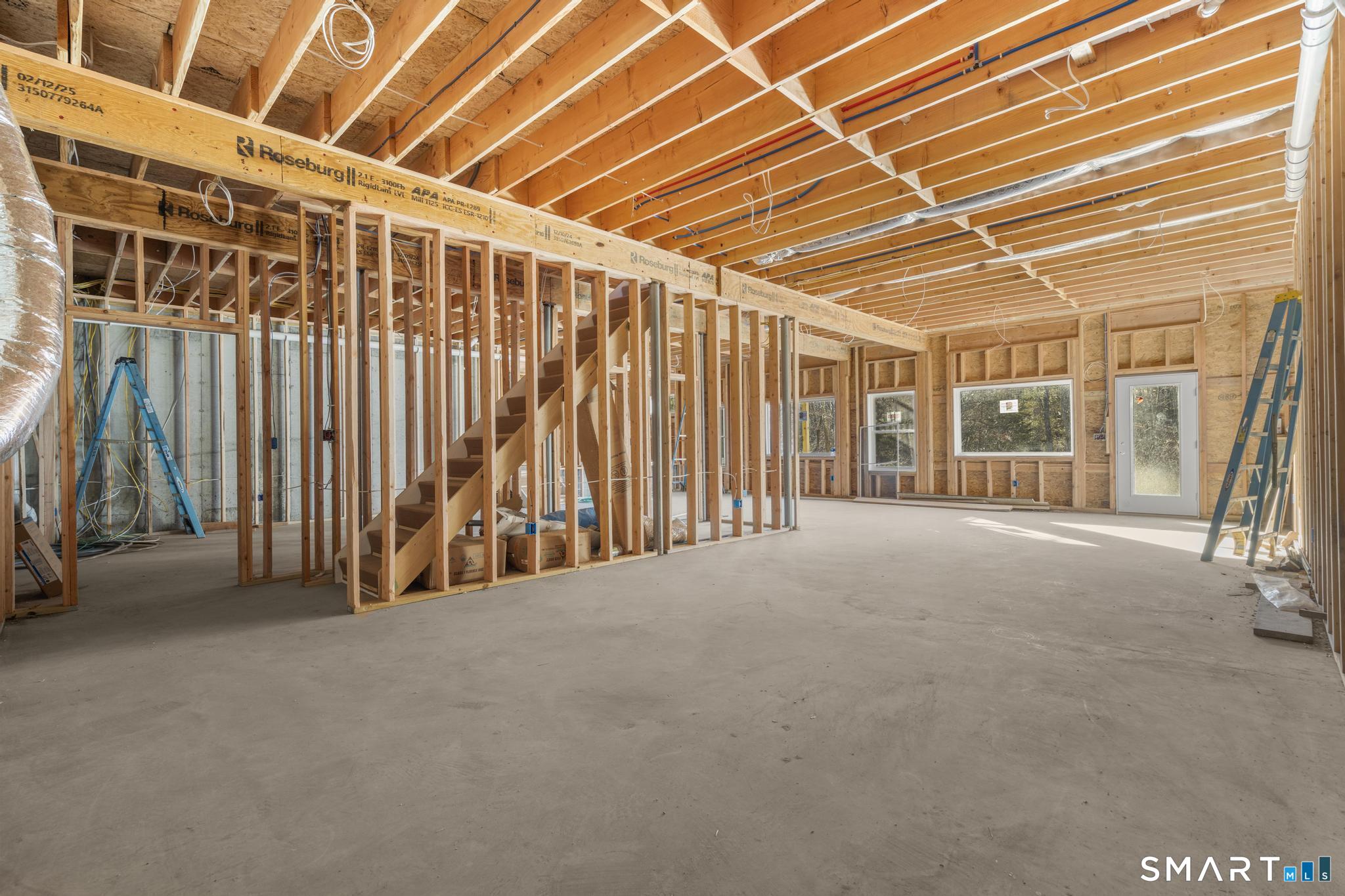 154 B Long Meadow Hill Road Brookfield, CT 06804 - Photo 26 of 37 a view of an empty room with wooden walls