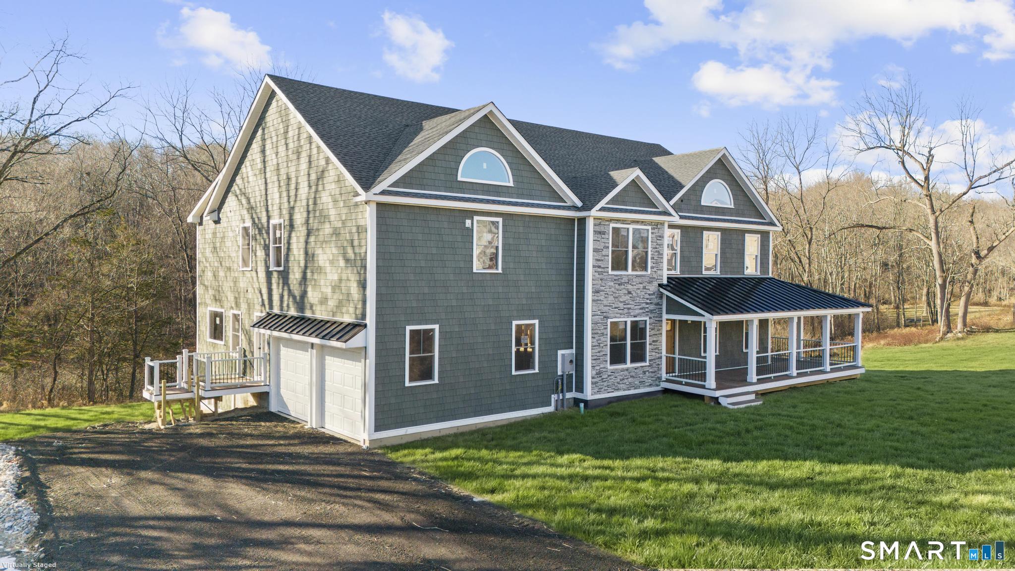 154 B Long Meadow Hill Road Brookfield, CT 06804 - Photo 33 of 37 a front view of a house with a yard
