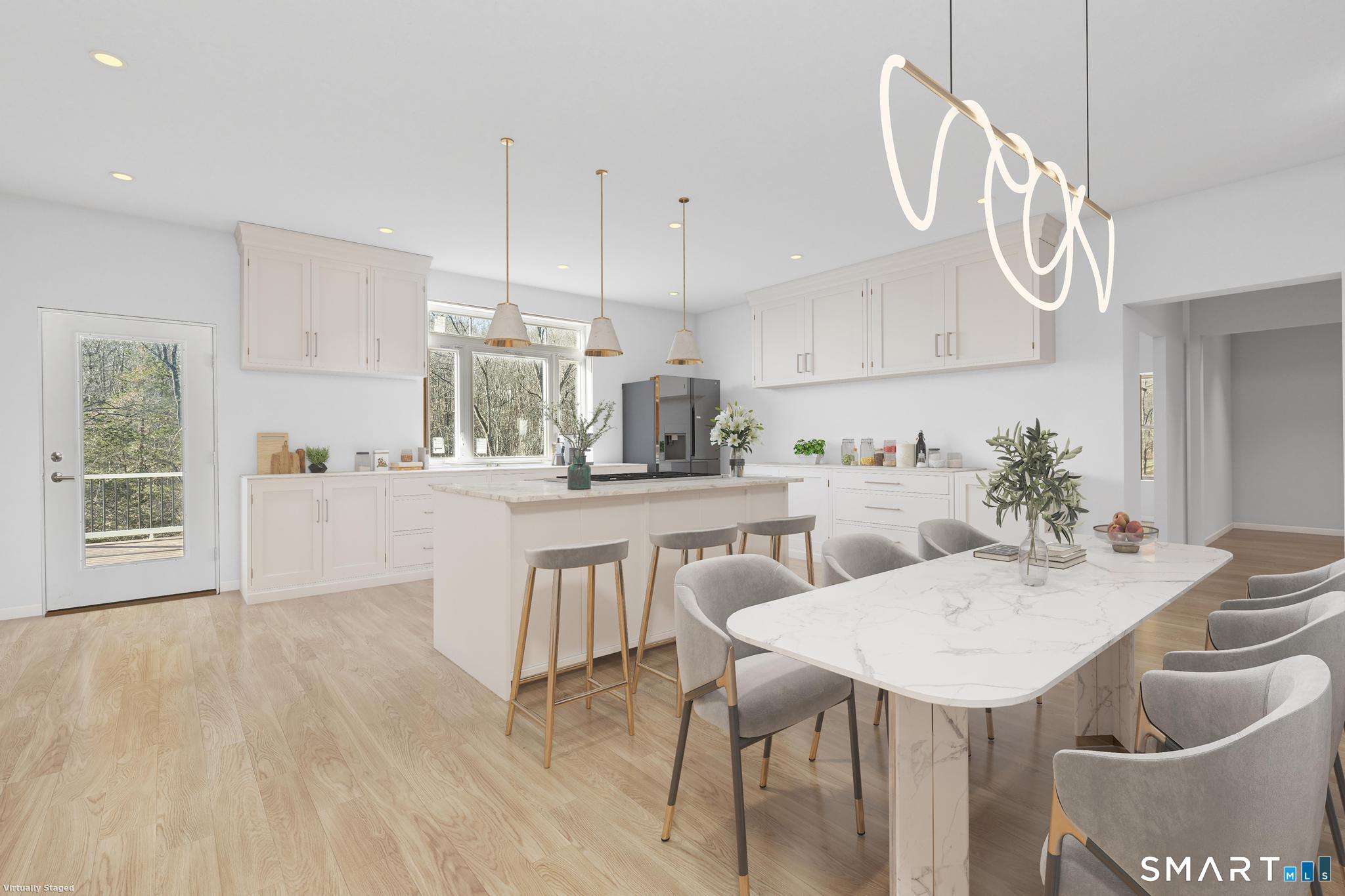 154 B Long Meadow Hill Road Brookfield, CT 06804 - Photo 7 of 37 a kitchen with kitchen island a table and chairs