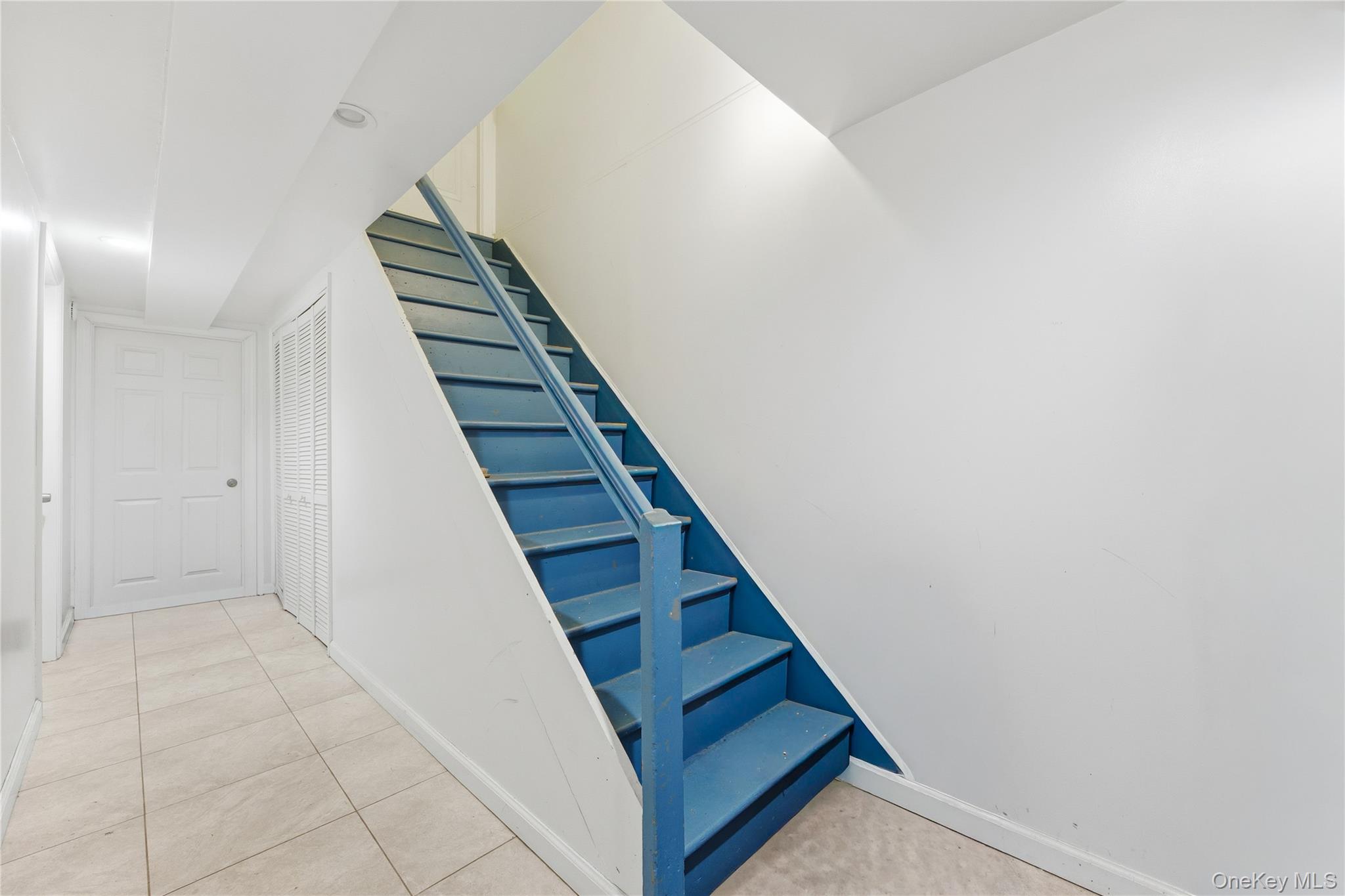 5-37 117th Street Queens, NY 11356 - Photo 20 of 28 a view of a hallway with staircase