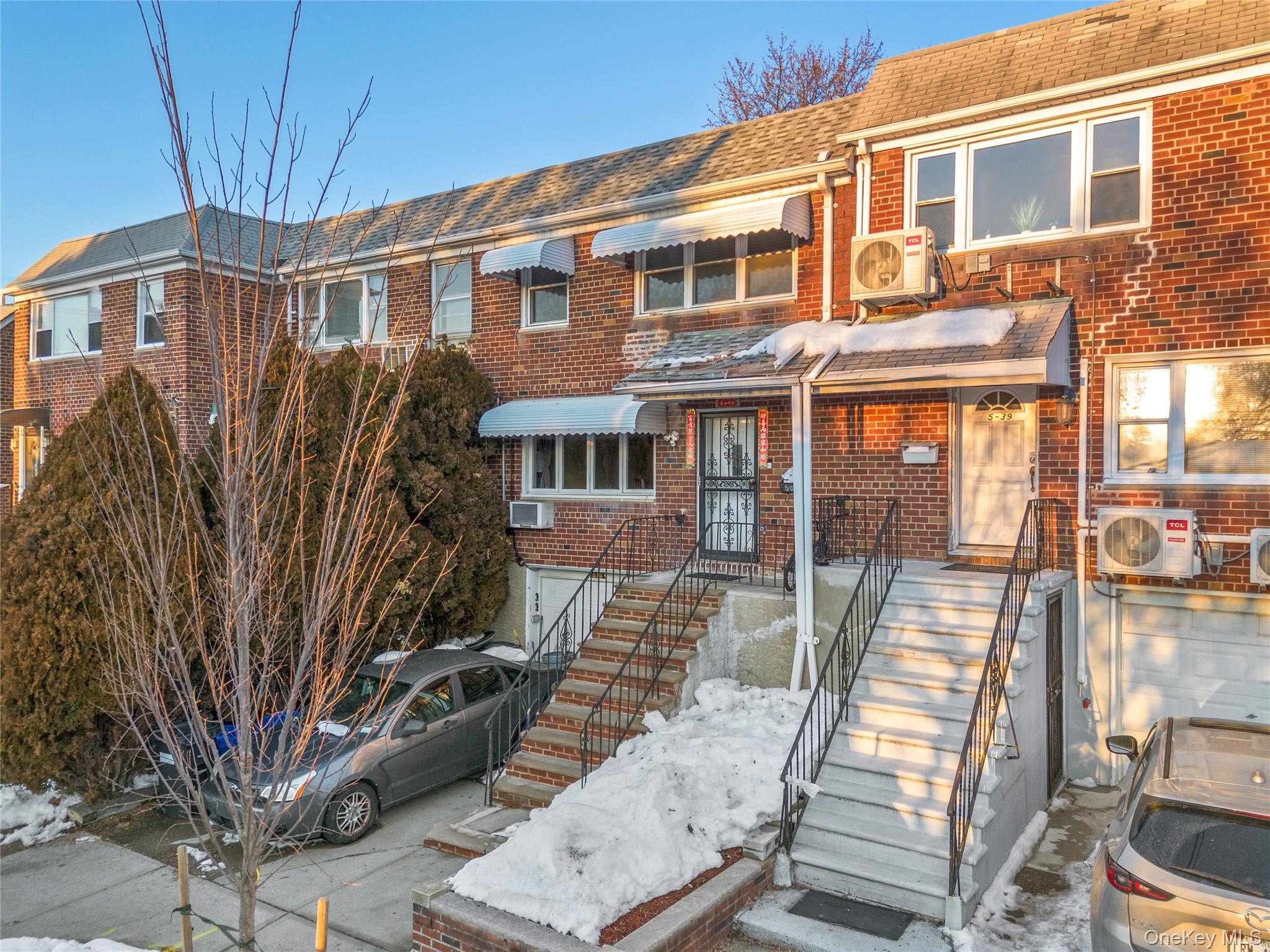 5-37 117th Street Queens, NY 11356 - Photo 2 of 28 a view of a front of house with a street