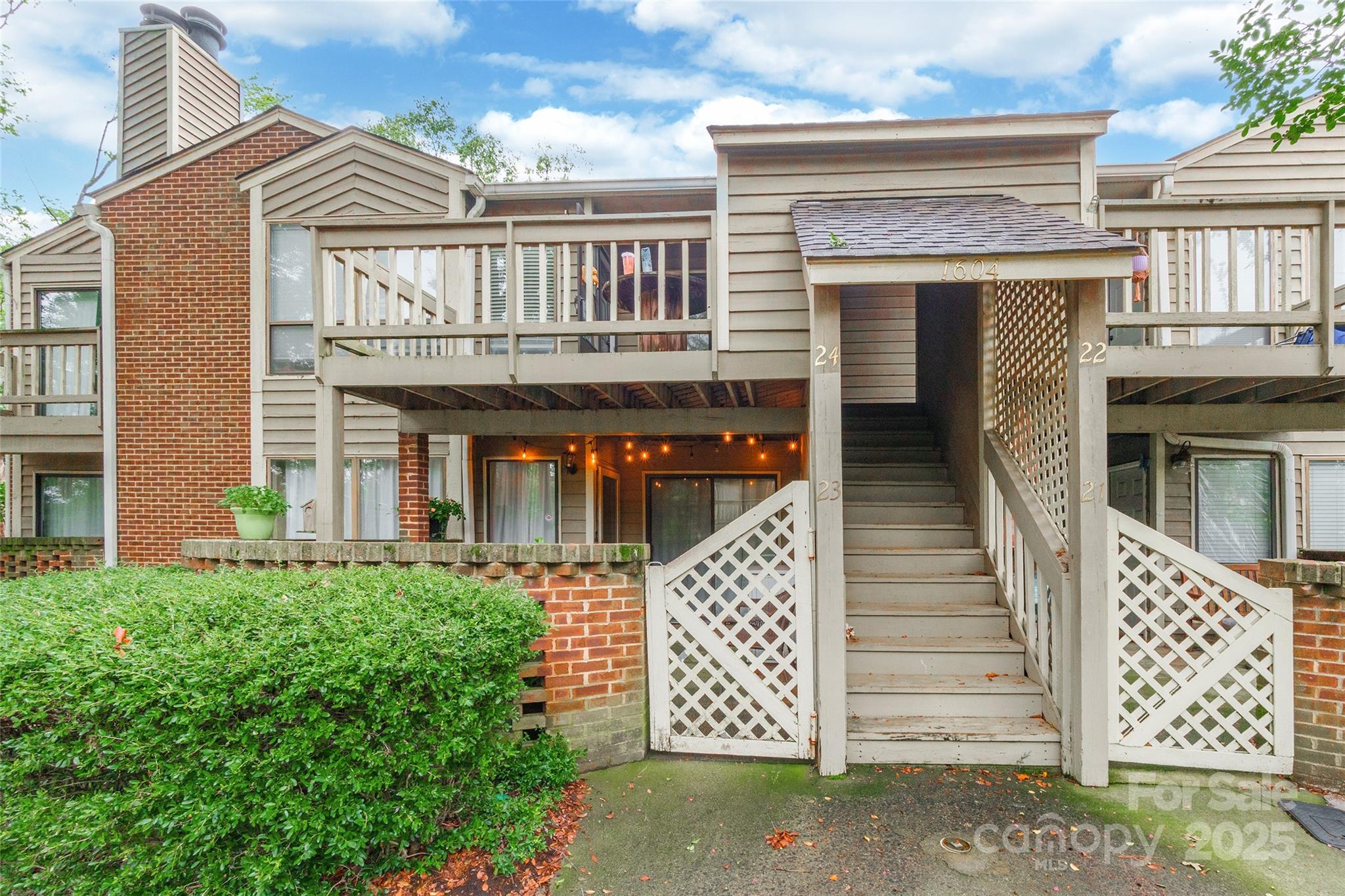 1604 Sharon Road West, Unit 23 Charlotte, NC 28210 - Photo 2 of 21 front view of a house with a window