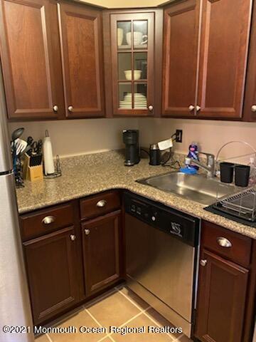 400 Cross Road, Unit A7 Matawan, NJ 07747 - Photo 3 of 10 a kitchen with sink and cabinets