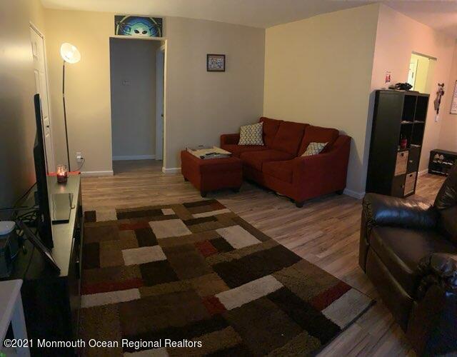 400 Cross Road, Unit A7 Matawan, NJ 07747 - Photo 7 of 10 a living room with furniture