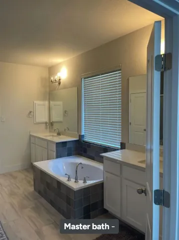 a living room with furniture a window and a table