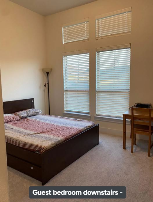 4308 Trey Edsel Drive Pflugerville, TX 78660 - Photo 4 of 22 a bedroom with a bed table chair and a window