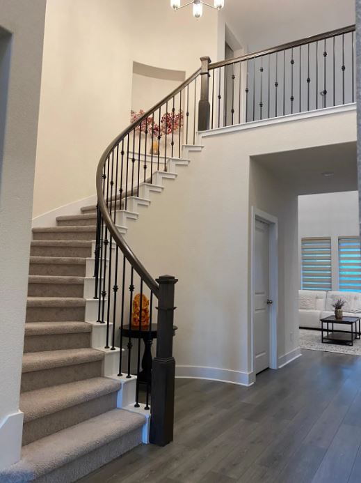 4308 Trey Edsel Drive Pflugerville, TX 78660 - Photo 5 of 22 a view of entryway and hall with wooden floor
