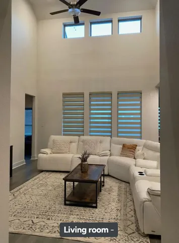 a room with a sink and a mirror