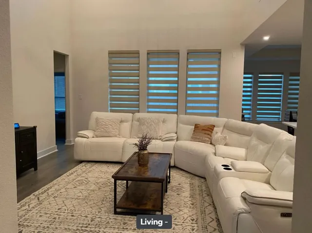 a kitchen with a sink appliances and cabinets