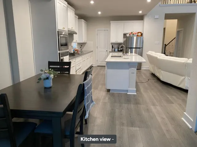 a view of a dining room with furniture