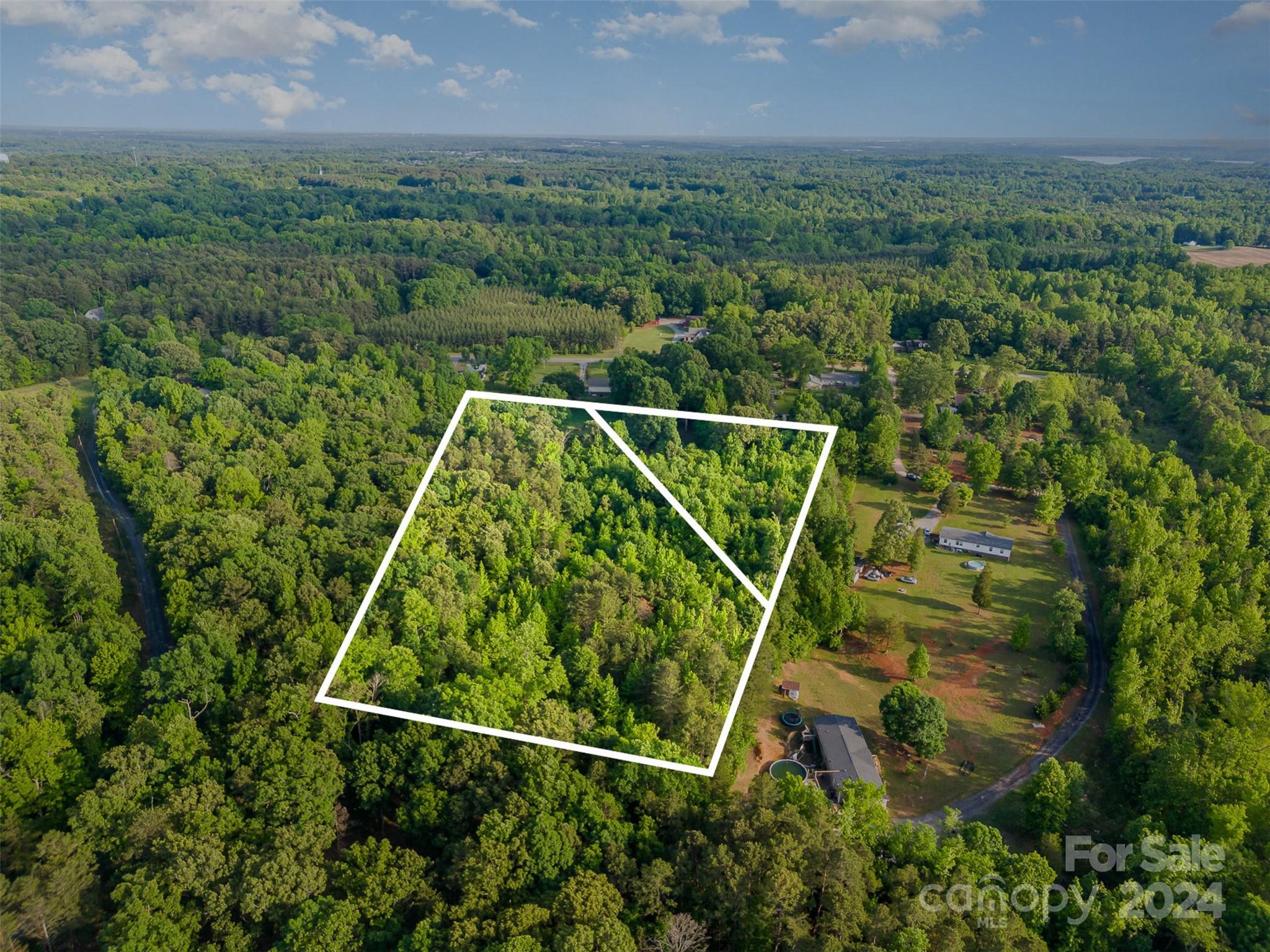 6720 Tuckaseegee Road Kannapolis, NC 28081 - Photo 16 of 16 an aerial view of a tennis court