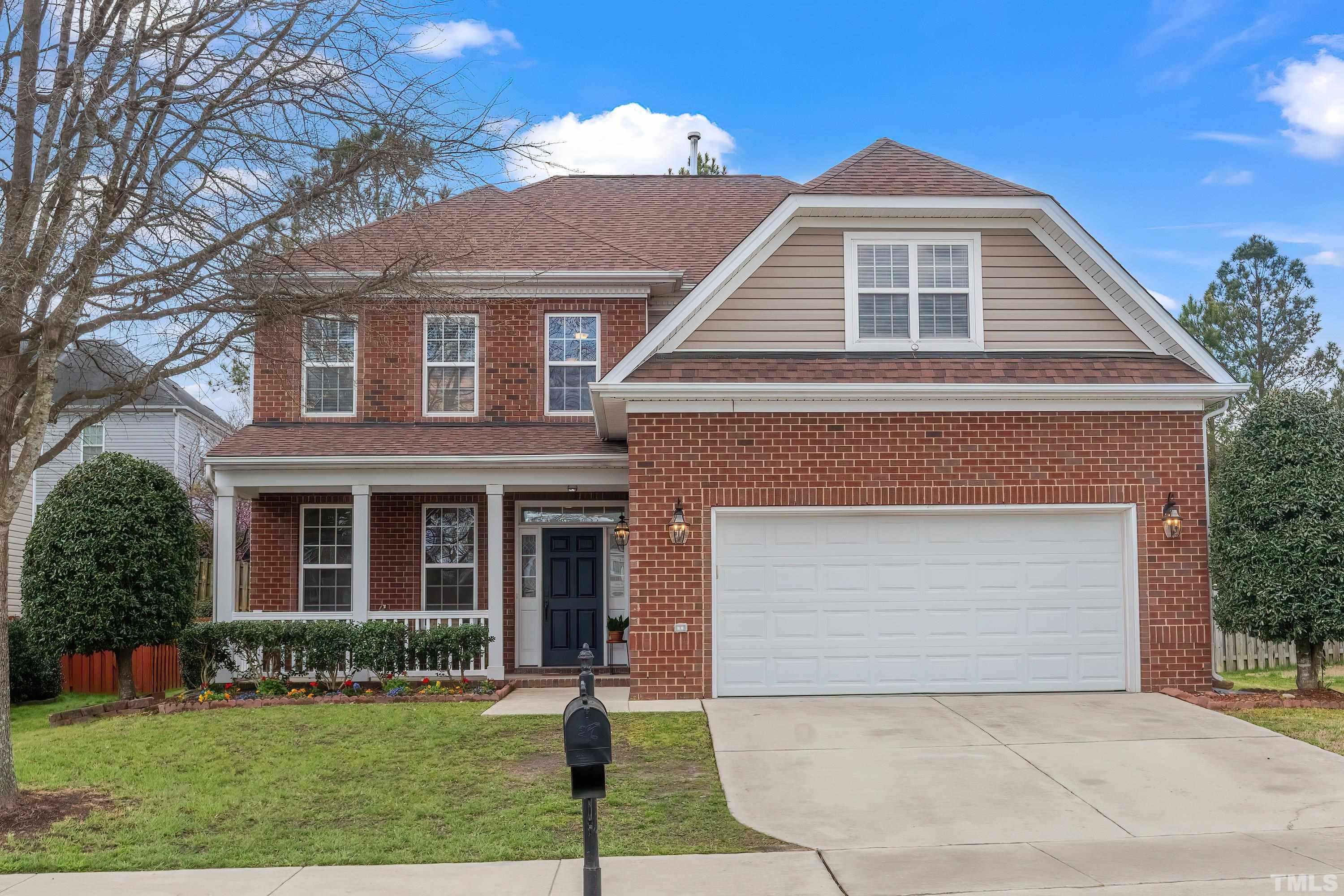 5225 Holly Ridge Farm Road Raleigh, NC 27616 - Photo 1 of 61 front view of a house with a yard