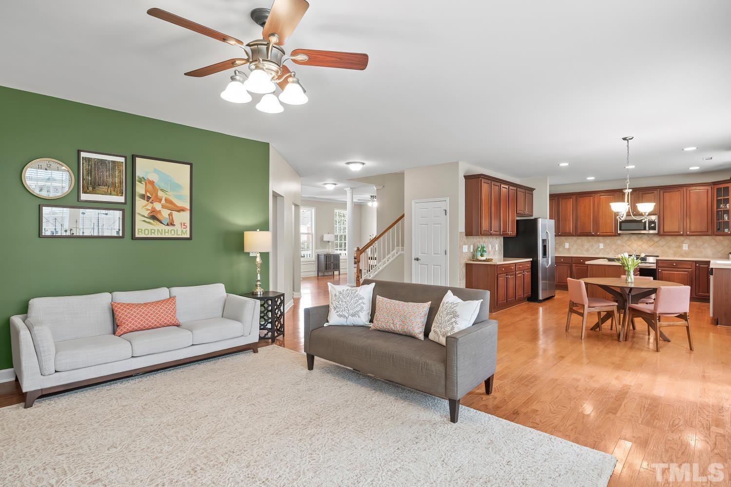 5225 Holly Ridge Farm Road Raleigh, NC 27616 - Photo 12 of 61 a living room with furniture and kitchen view