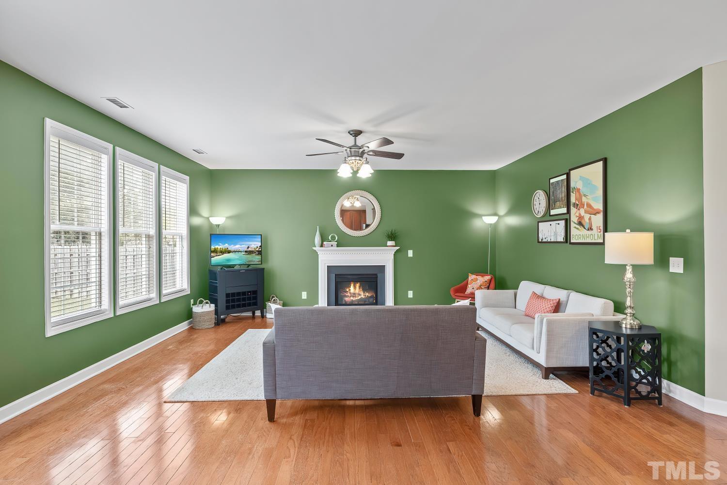 5225 Holly Ridge Farm Road Raleigh, NC 27616 - Photo 10 of 61 a living room with furniture and a fireplace