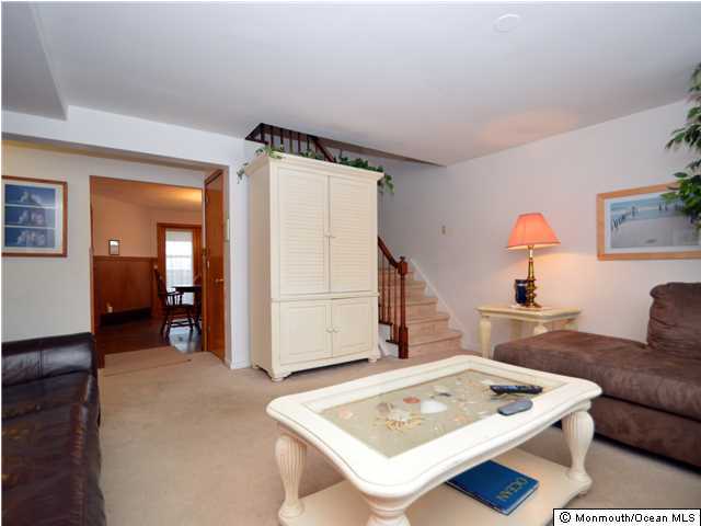201 Forman Avenue Point Pleasant Beach, NJ 08742 - Photo 13 of 25 a view of kitchen island with furniture and refrigerator