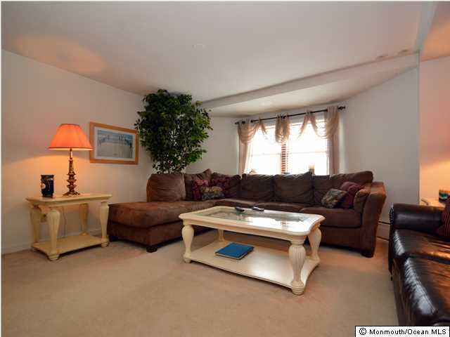 201 Forman Avenue Point Pleasant Beach, NJ 08742 - Photo 14 of 25 a living room with furniture and a large window