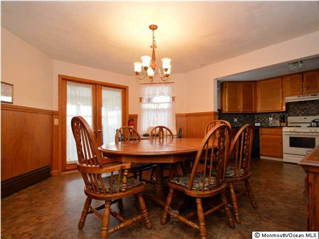 201 Forman Avenue Point Pleasant Beach, NJ 08742 - Photo 16 of 25 a view of a dining room with furniture window and wooden floor