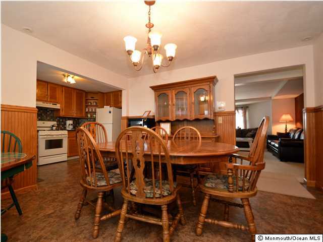 201 Forman Avenue Point Pleasant Beach, NJ 08742 - Photo 17 of 25 a view of a dining room with furniture and chandelier