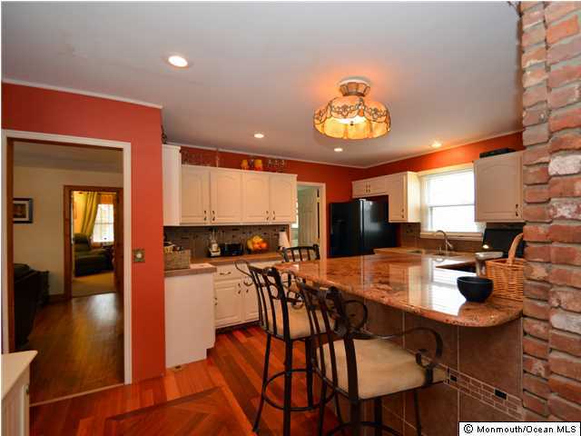 201 Forman Avenue Point Pleasant Beach, NJ 08742 - Photo 2 of 25 a view of a dining room with furniture window and wooden floor
