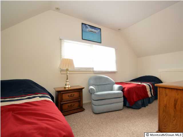 201 Forman Avenue Point Pleasant Beach, NJ 08742 - Photo 22 of 25 a bedroom with two beds and a window